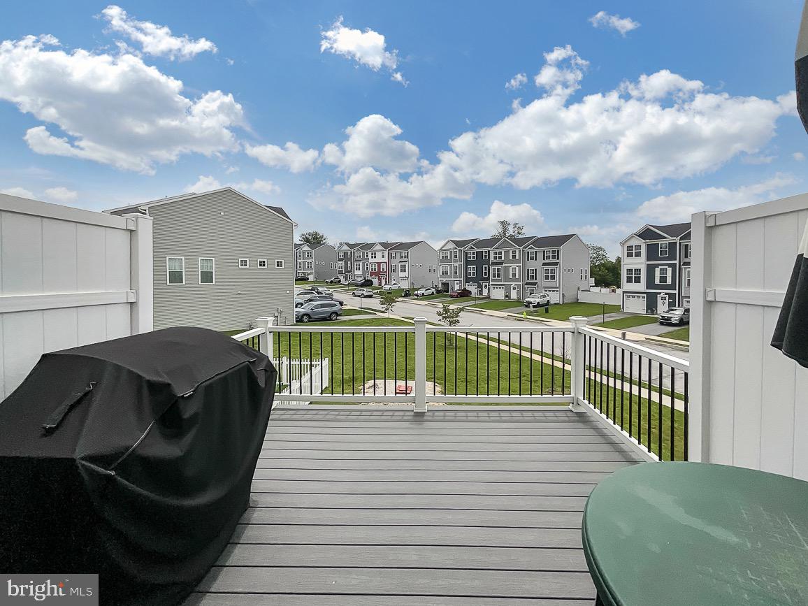 144 Overlook Dr. Hanover, PA 17331 - Photo 26 of 26 a view of balcony with barbeque grill and wooden floor