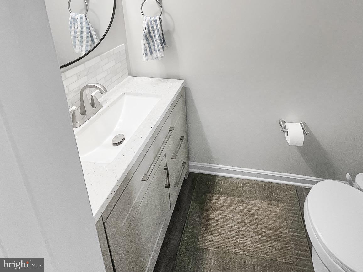 144 Overlook Dr. Hanover, PA 17331 - Photo 3 of 26 a bathroom with a sink and mirror with bathtub