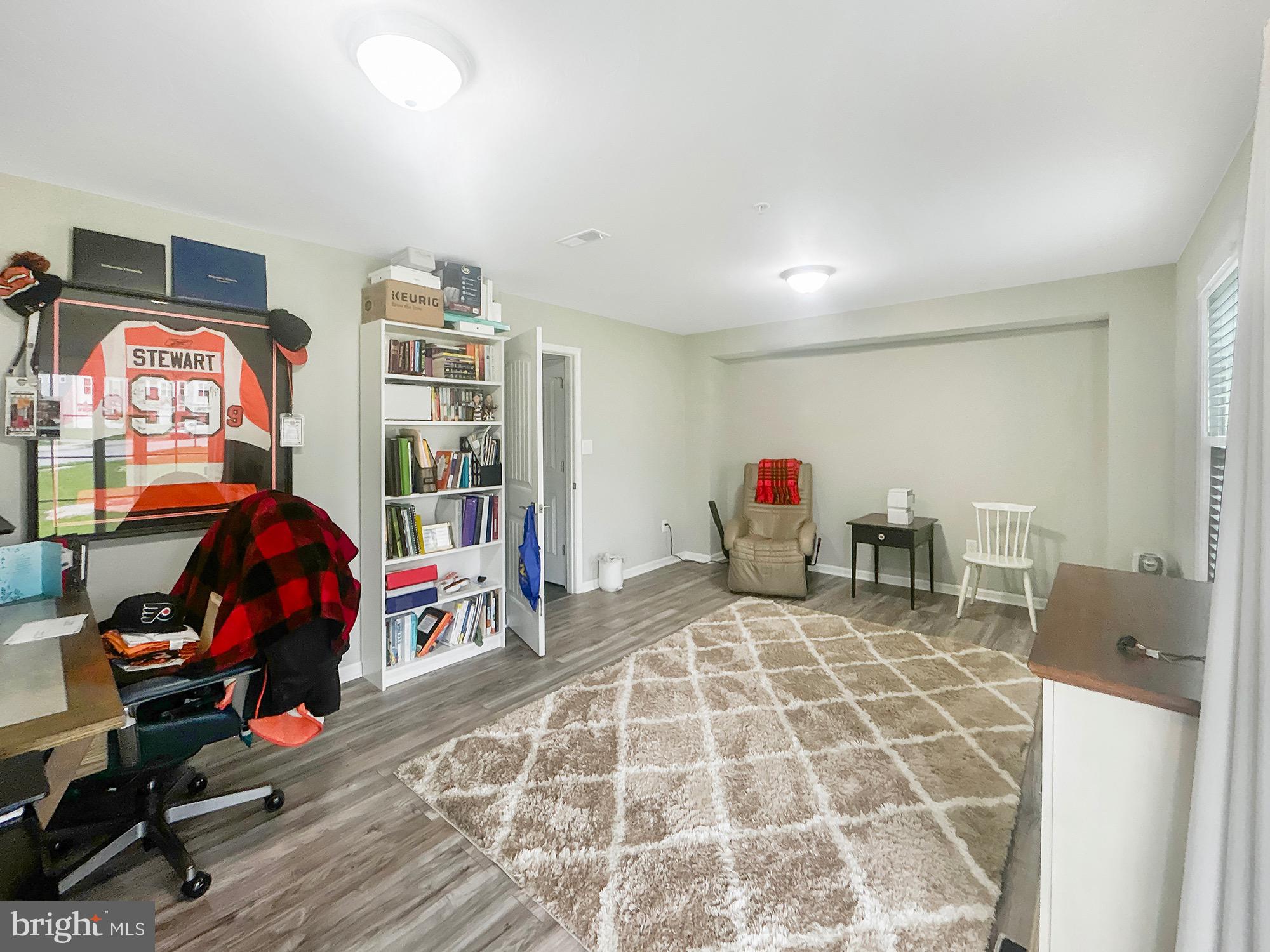 144 Overlook Dr. Hanover, PA 17331 - Photo 6 of 26 a bedroom with furniture and a flat screen tv