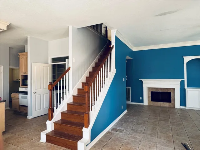 a view of an entryway and livingroom with furniture
