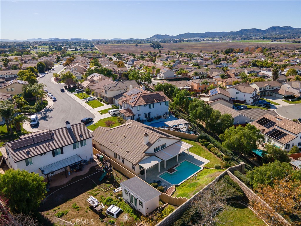 31677 Middlebrook Lane Menifee, CA 92584 - Photo 42 of 42 an aerial view of a house with a mountain