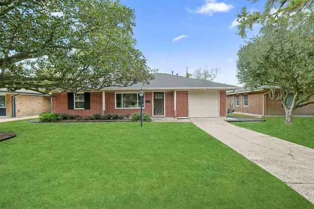 front view of a house and a yard