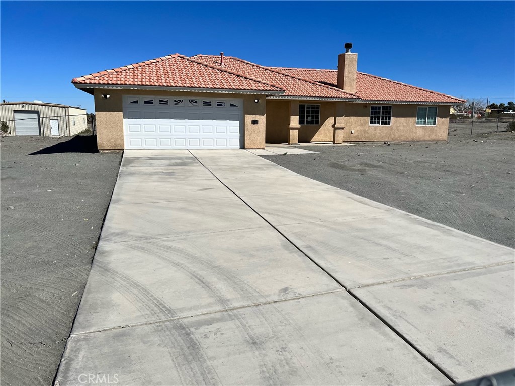 11975 Amarillo Road Phelan, CA 92371 - Photo 1 of 1 a front view of a house