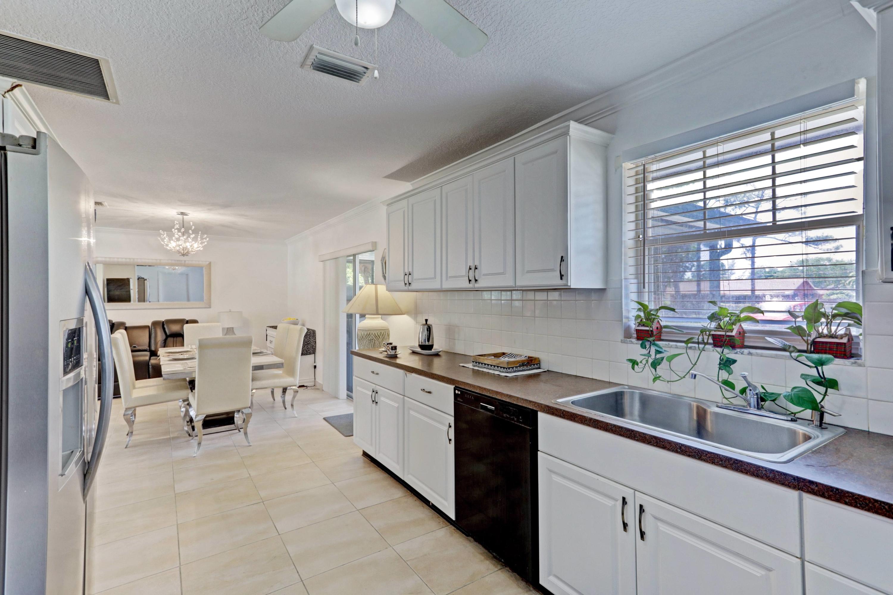 3581 Jog Road Greenacres, FL 33467 - Photo 26 of 28 5 - Kitchen 3