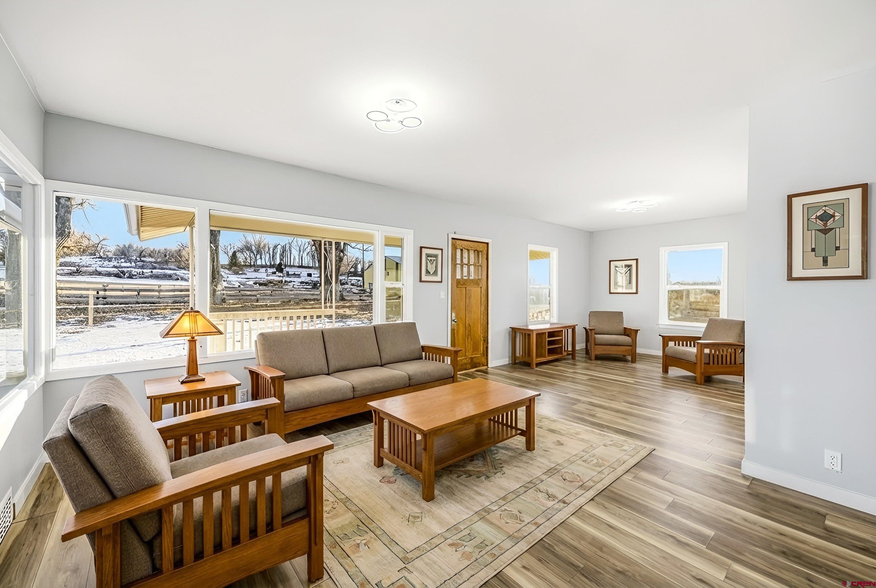 6038 Townsend Road Delta, CO 81416 - Photo 13 of 45 a living room with furniture and a large window