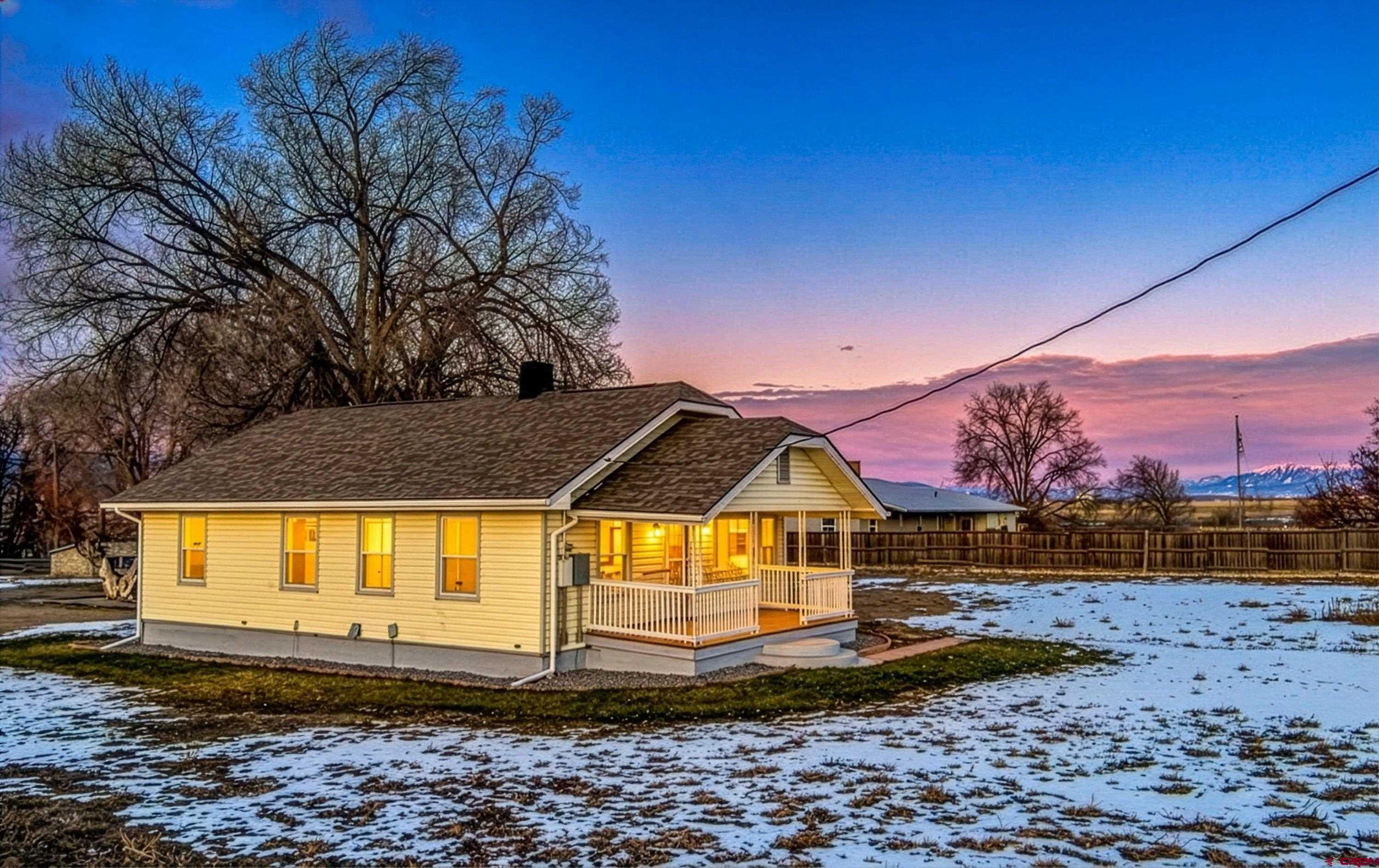 6038 Townsend Road Delta, CO 81416 - Photo 19 of 45 a view of a yard in front of the house