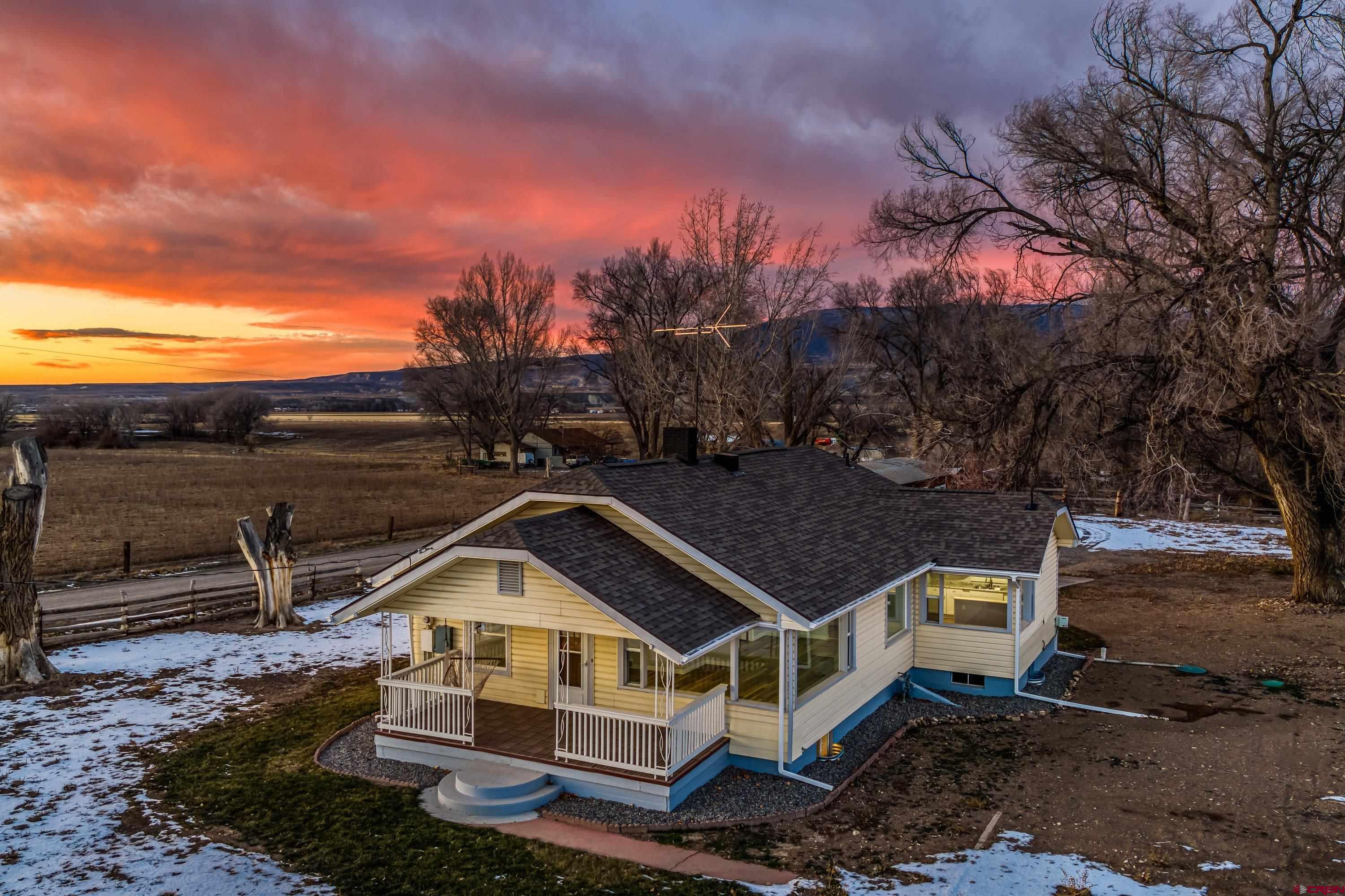 6038 Townsend Road Delta, CO 81416 - Photo 37 of 45 a front view of a house with a yard