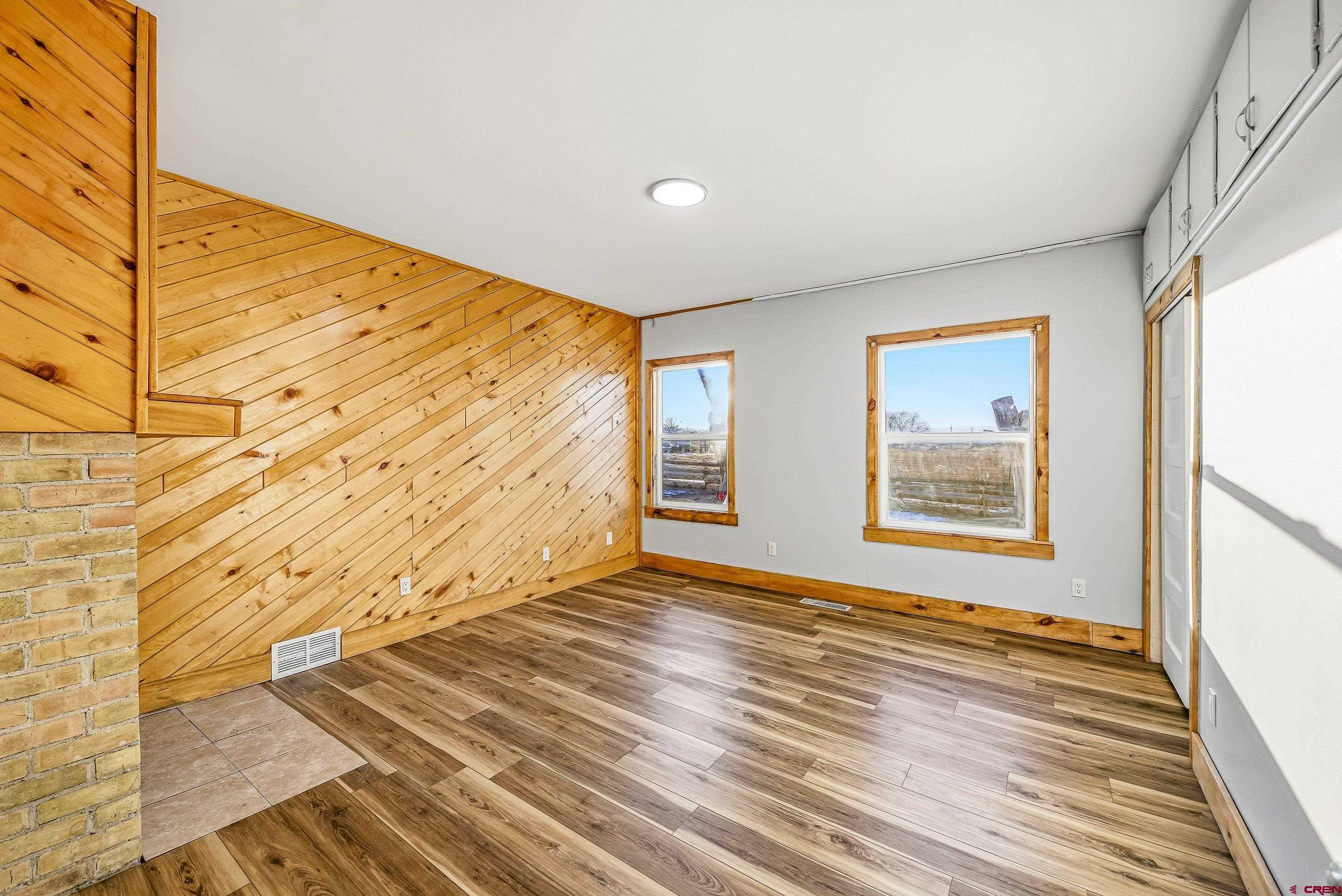 6038 Townsend Road Delta, CO 81416 - Photo 6 of 45 a view of an empty room and window
