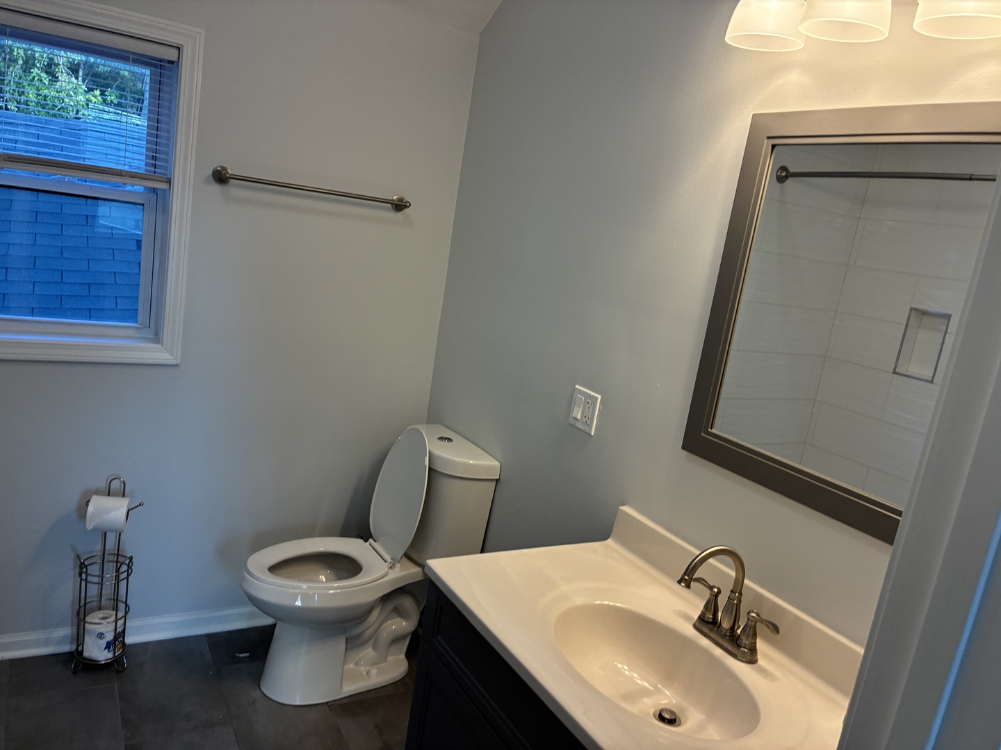 544 West Cullerton Street, Unit 2 Chicago, IL 60616 - Photo 10 of 15 a bathroom with a sink toilet and mirror