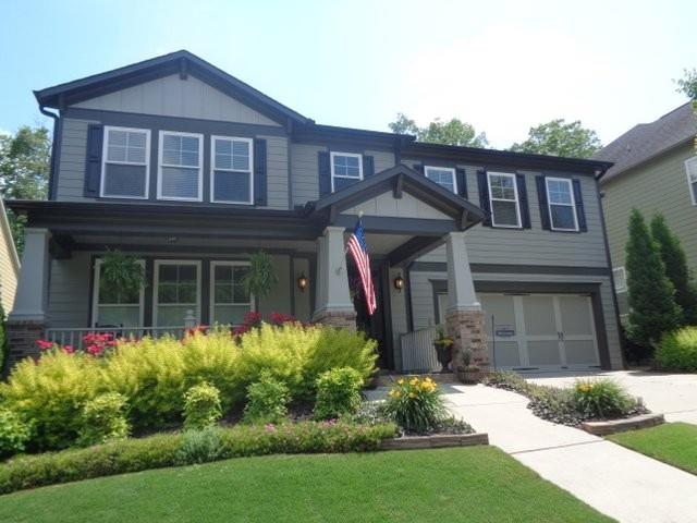 320 New Point Lane Canton, GA 30114 - Photo 1 of 1 a front view of a house with garden