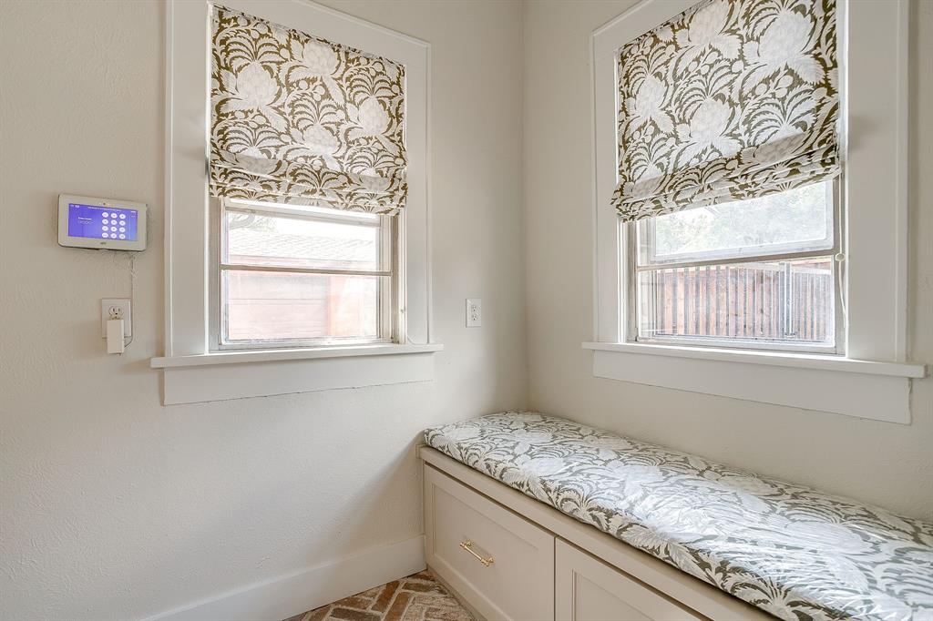 2209 West Rosedale Street South Fort Worth, TX 76110 - Photo 21 of 40 a room with a granite countertop sink and window