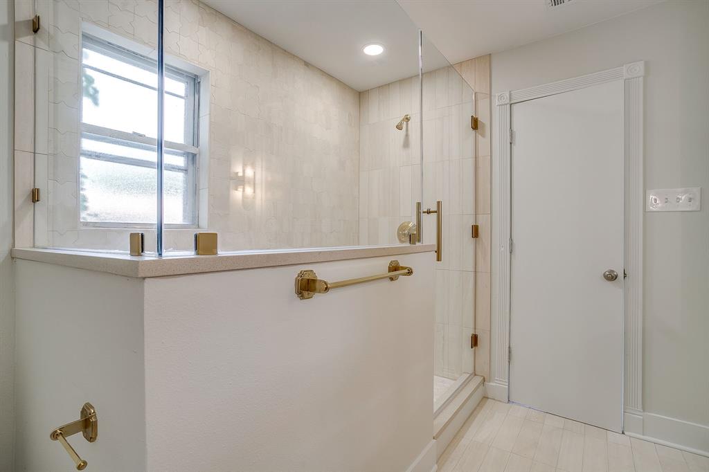 2209 West Rosedale Street South Fort Worth, TX 76110 - Photo 30 of 40 a view of a bathroom with a shower