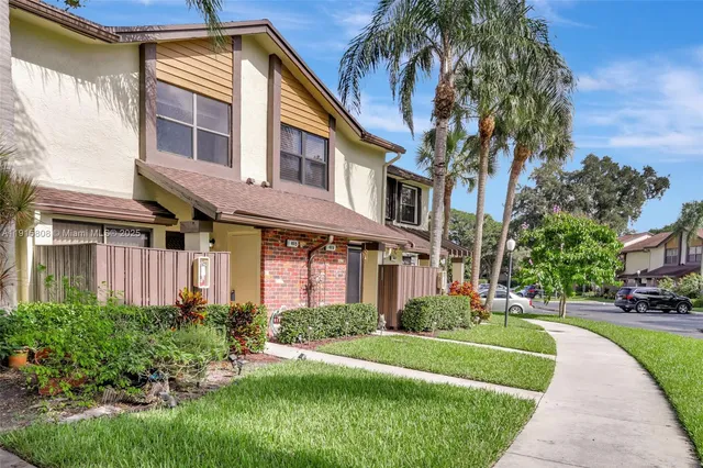 a view of a house with swimming pool