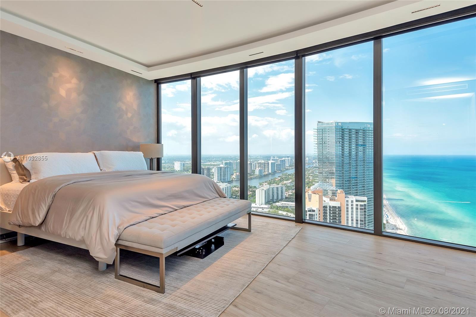 North Biscayne Beach Sunny Isles Beach, FL 33160 - Photo 2 of 52 a spacious bedroom with a large bed and a large window