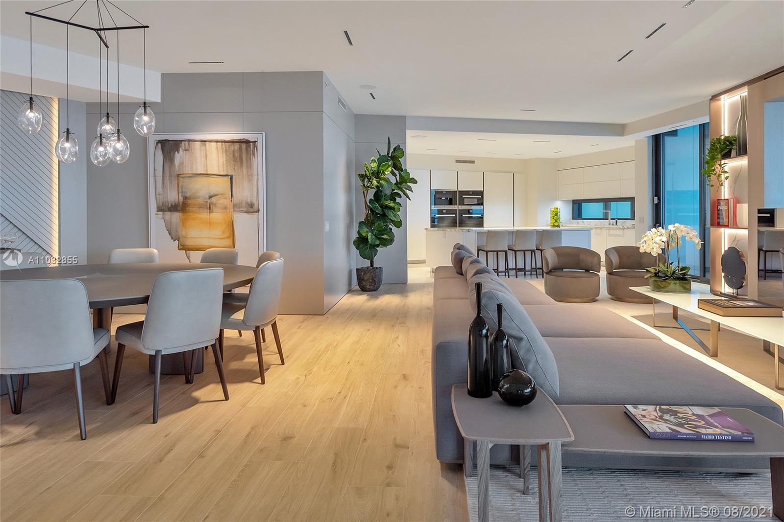 North Biscayne Beach Sunny Isles Beach, FL 33160 - Photo 12 of 52 a living room with furniture and a table