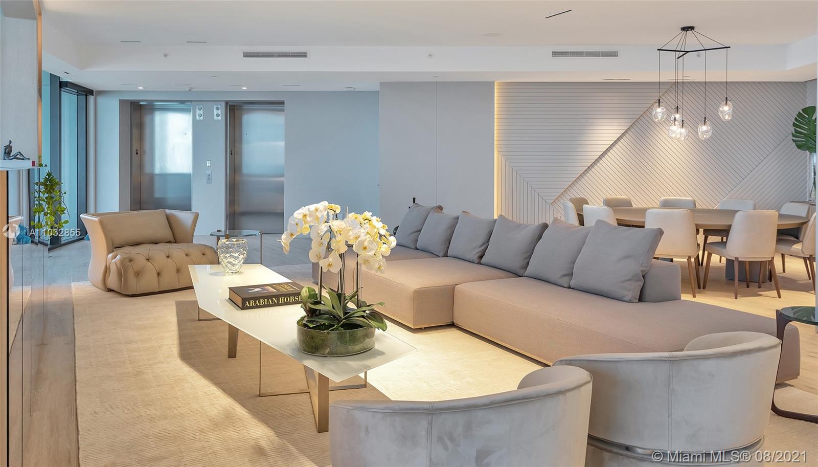 North Biscayne Beach Sunny Isles Beach, FL 33160 - Photo 13 of 52 a living room with furniture and wooden floor