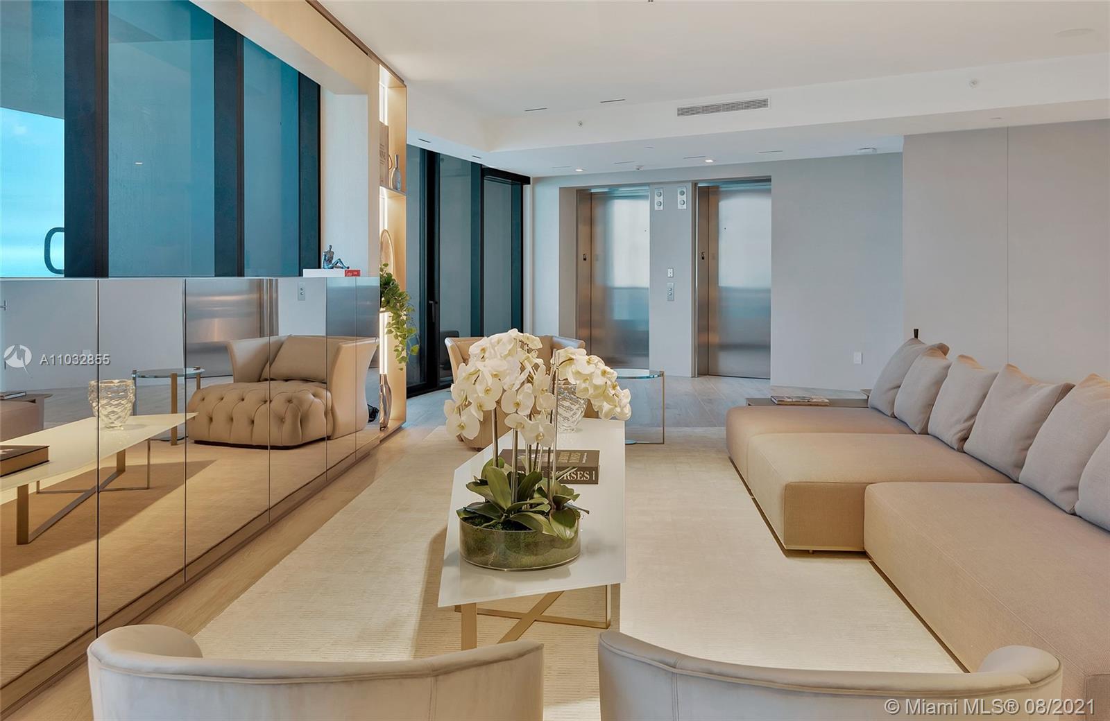 North Biscayne Beach Sunny Isles Beach, FL 33160 - Photo 14 of 52 a living room with furniture and a large window