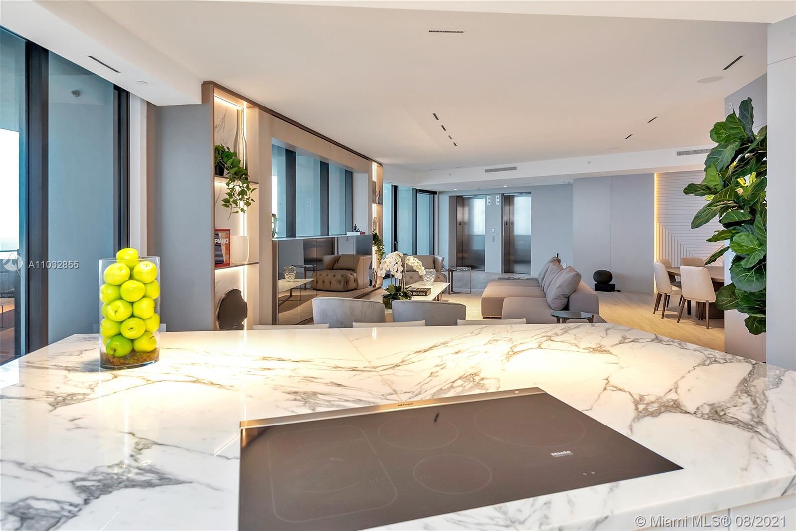 North Biscayne Beach Sunny Isles Beach, FL 33160 - Photo 19 of 52 a view of living room and kitchen