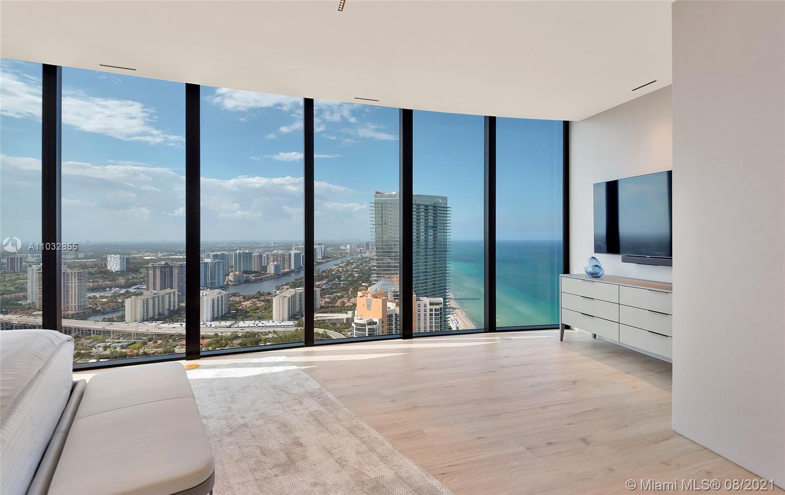 North Biscayne Beach Sunny Isles Beach, FL 33160 - Photo 32 of 52 a view of a living room hardwood floor and a large window