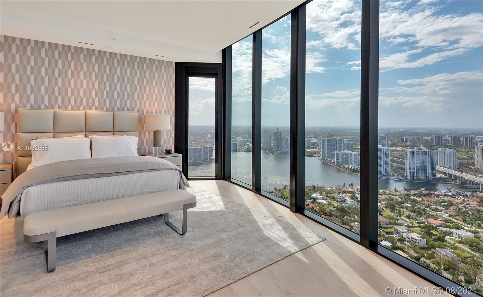 North Biscayne Beach Sunny Isles Beach, FL 33160 - Photo 33 of 52 a spacious bedroom with a large window and a bed