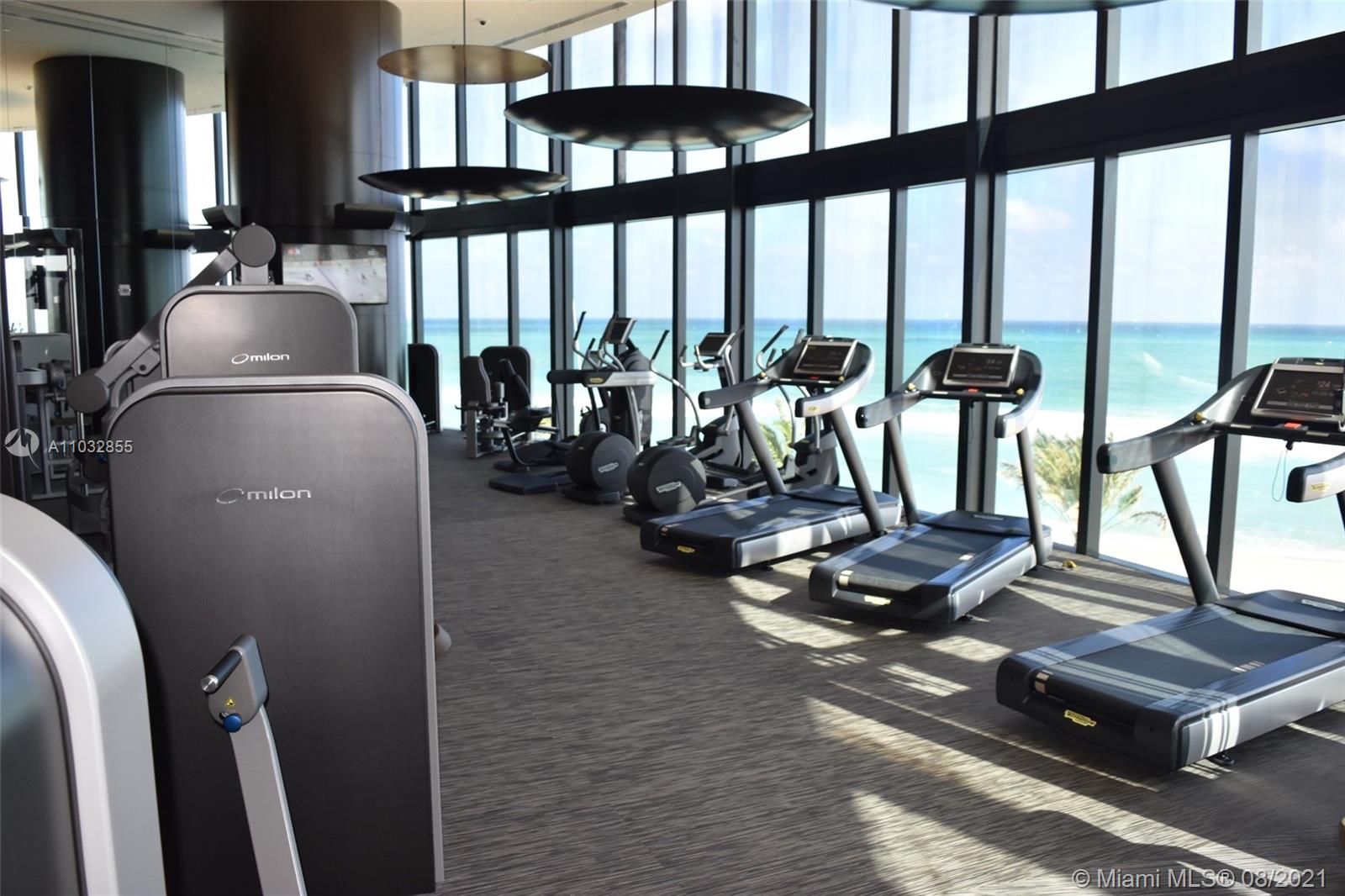 North Biscayne Beach Sunny Isles Beach, FL 33160 - Photo 44 of 52 a room with gym equipment and large windows
