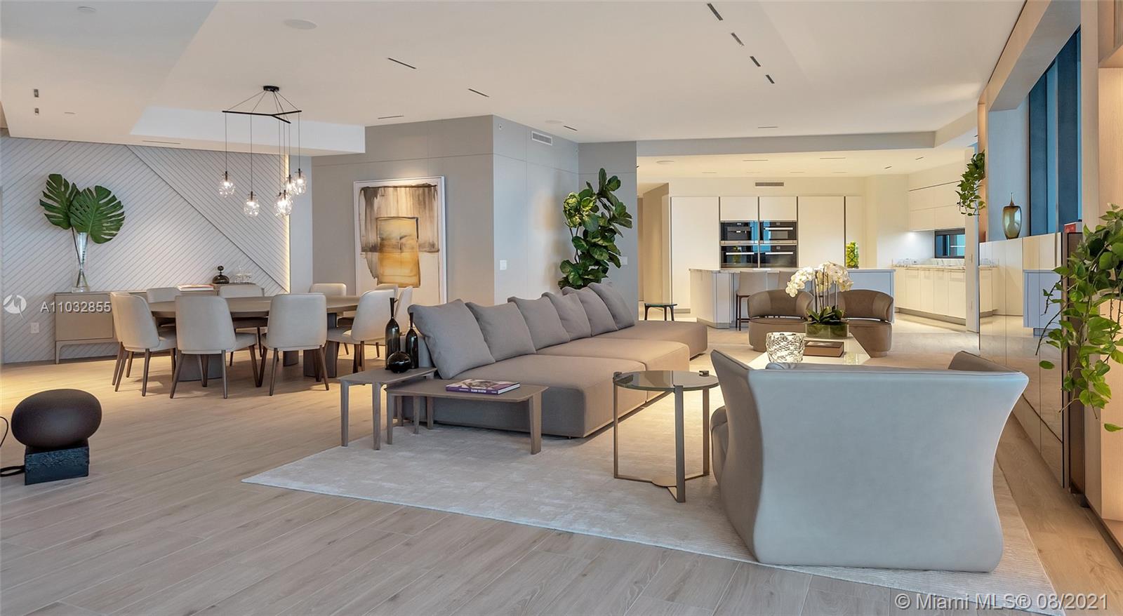 North Biscayne Beach Sunny Isles Beach, FL 33160 - Photo 9 of 52 a living room with furniture and a large window