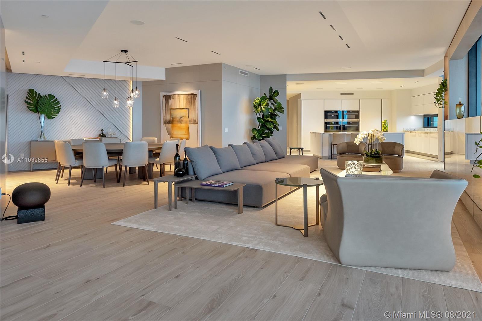 North Biscayne Beach Sunny Isles Beach, FL 33160 - Photo 10 of 52 a living room with furniture and a large window