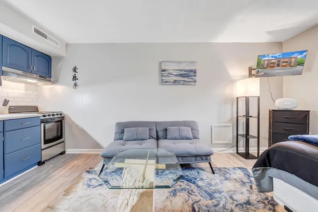 a living room with furniture and a couch