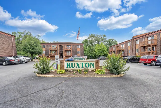a view of street with parked cars