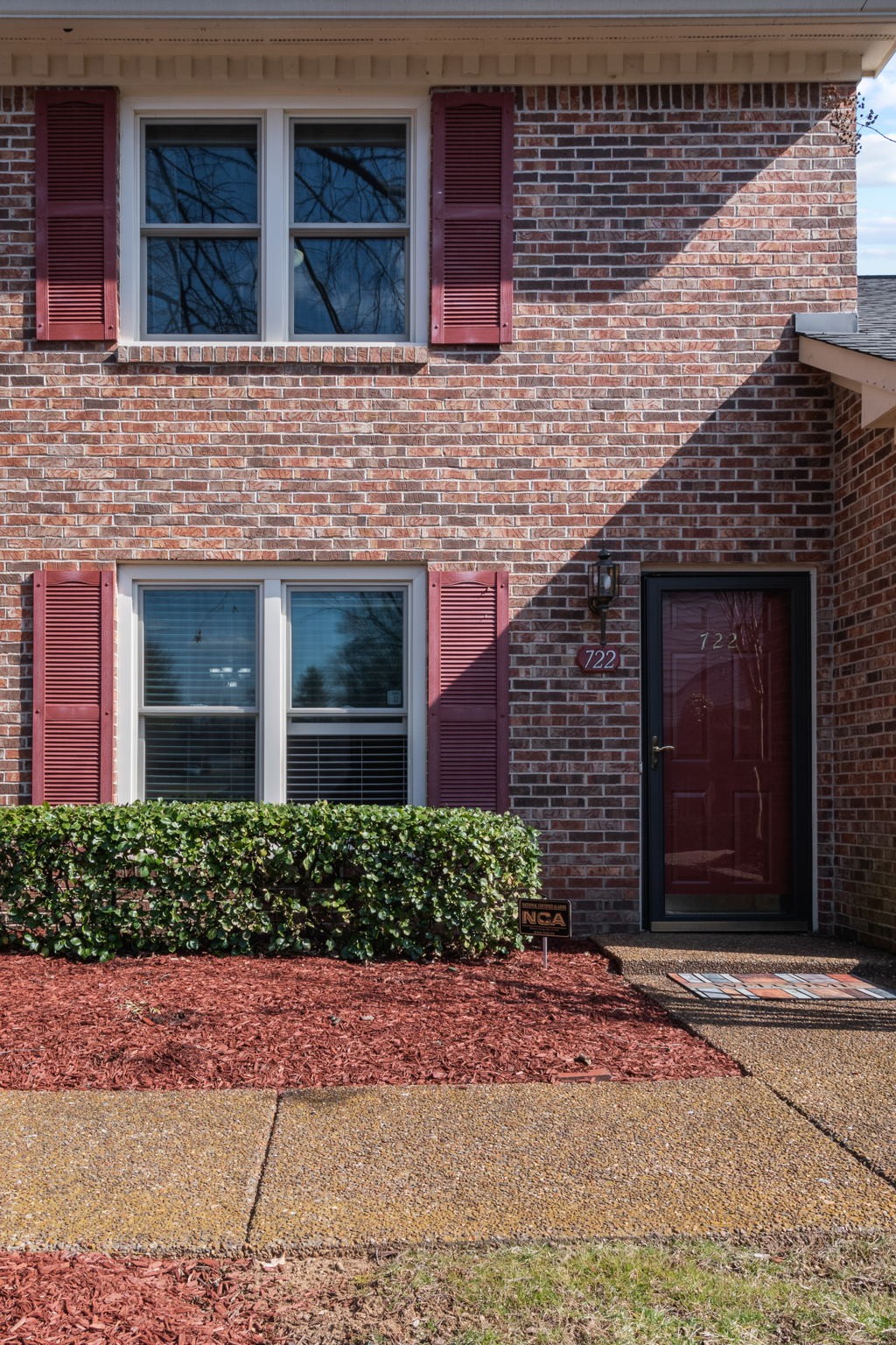 722 Kent Road Nashville, TN 37214 - Photo 4 of 17 a front view of a house with a garden