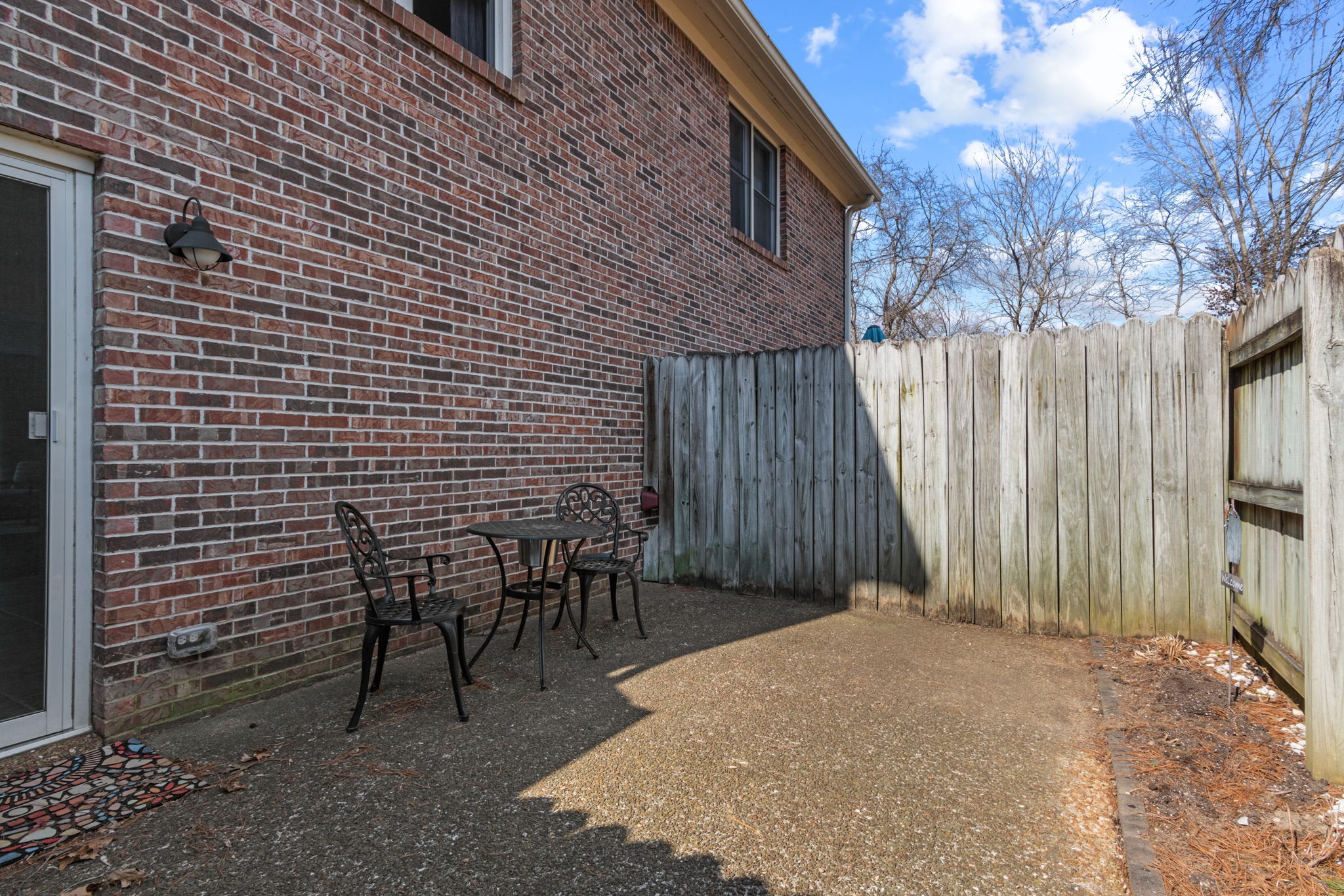 722 Kent Road Nashville, TN 37214 - Photo 5 of 17 a view of backyard with barbeque grill and wooden fence