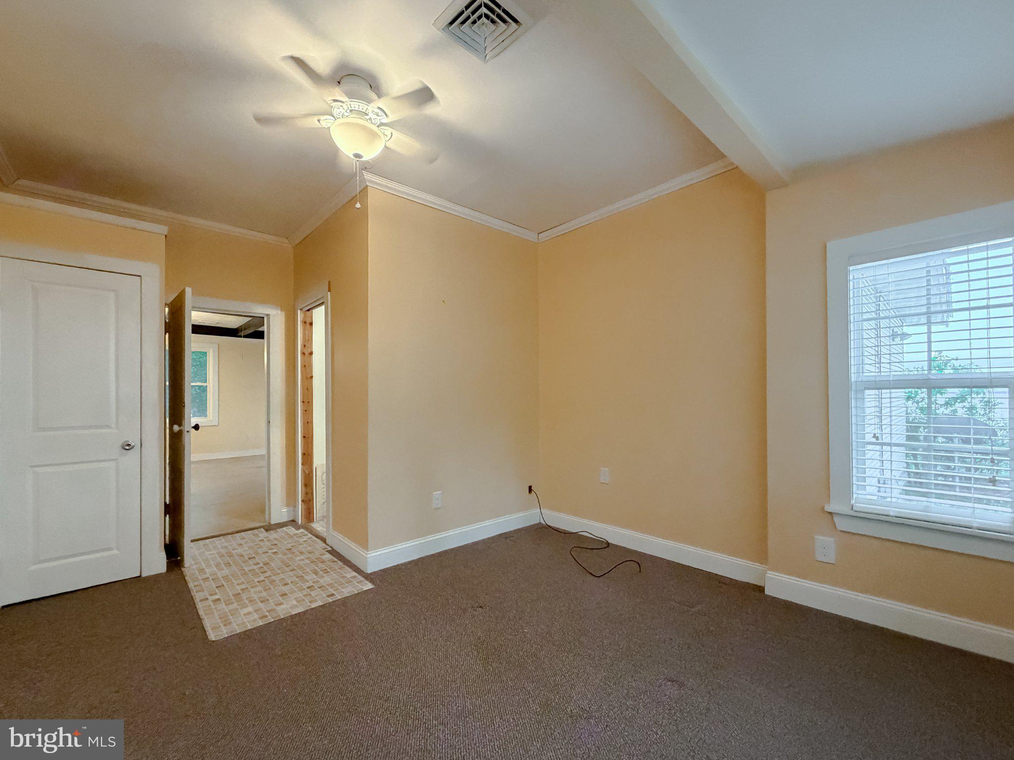 42195 White Point Beach Road Leonardtown, MD 20650 - Photo 47 of 57 Cozy room with warm, inviting tones.