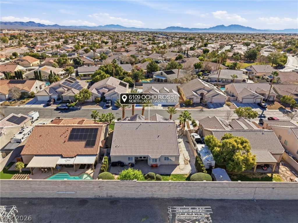 6109 Ocho Rios Street Las Vegas, NV 89130 - Photo 32 of 36 Drone / aerial view of a mountain backdrop