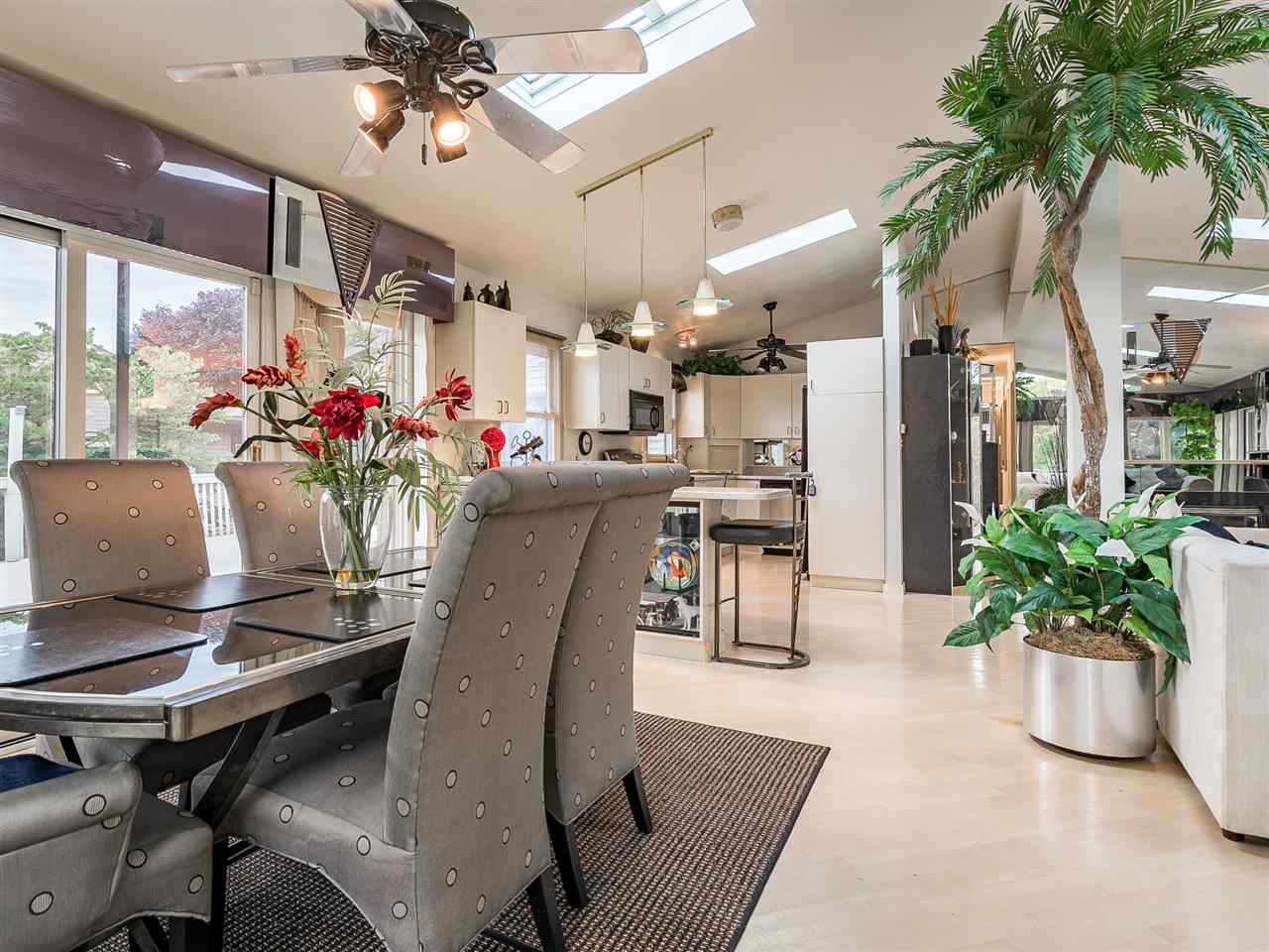 516 Baintree Road Davis, IL 61019 - Photo 16 of 25 a view of a dining room with furniture and a potted plant