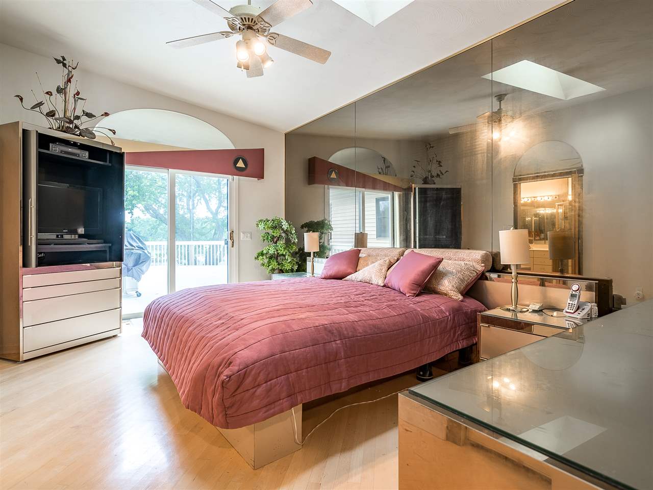 516 Baintree Road Davis, IL 61019 - Photo 19 of 25 a bed room with a bed and a chandelier