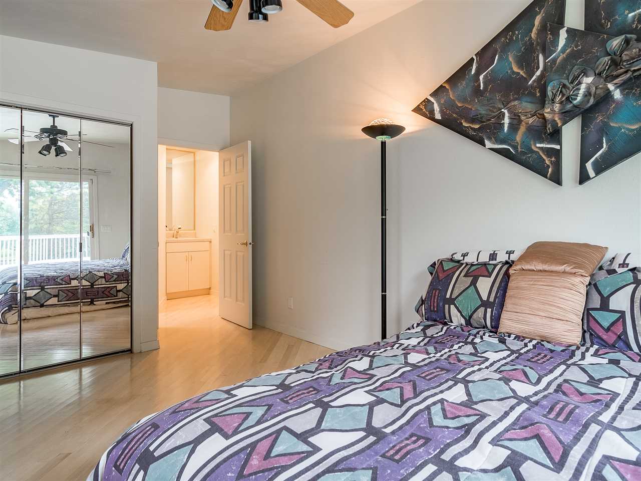 516 Baintree Road Davis, IL 61019 - Photo 21 of 25 a bedroom with a bed and wooden floor