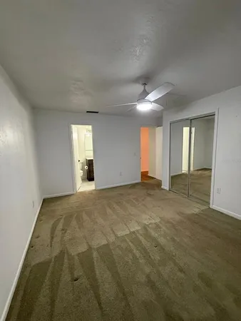 a view of an empty room and window