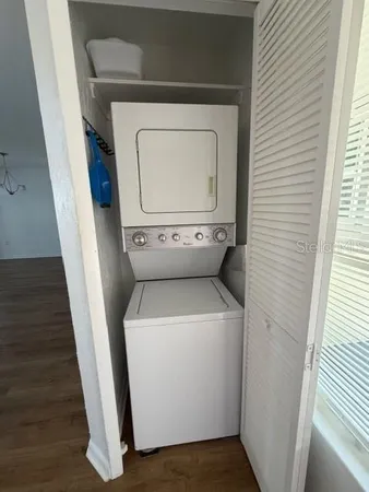 a utility room with dryer and washer