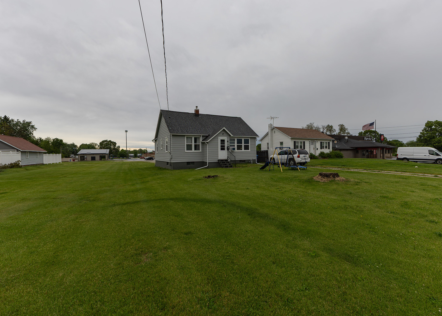 116 West Garfield Street Kewanee, IL 61443 - Photo 2 of 18 a view of a house with a big yard