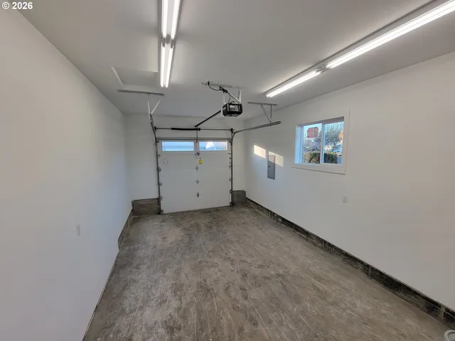 en empty room with windows