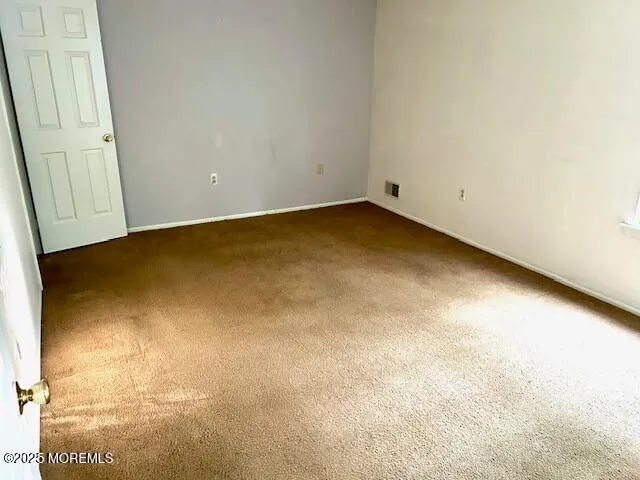 an empty room with a door