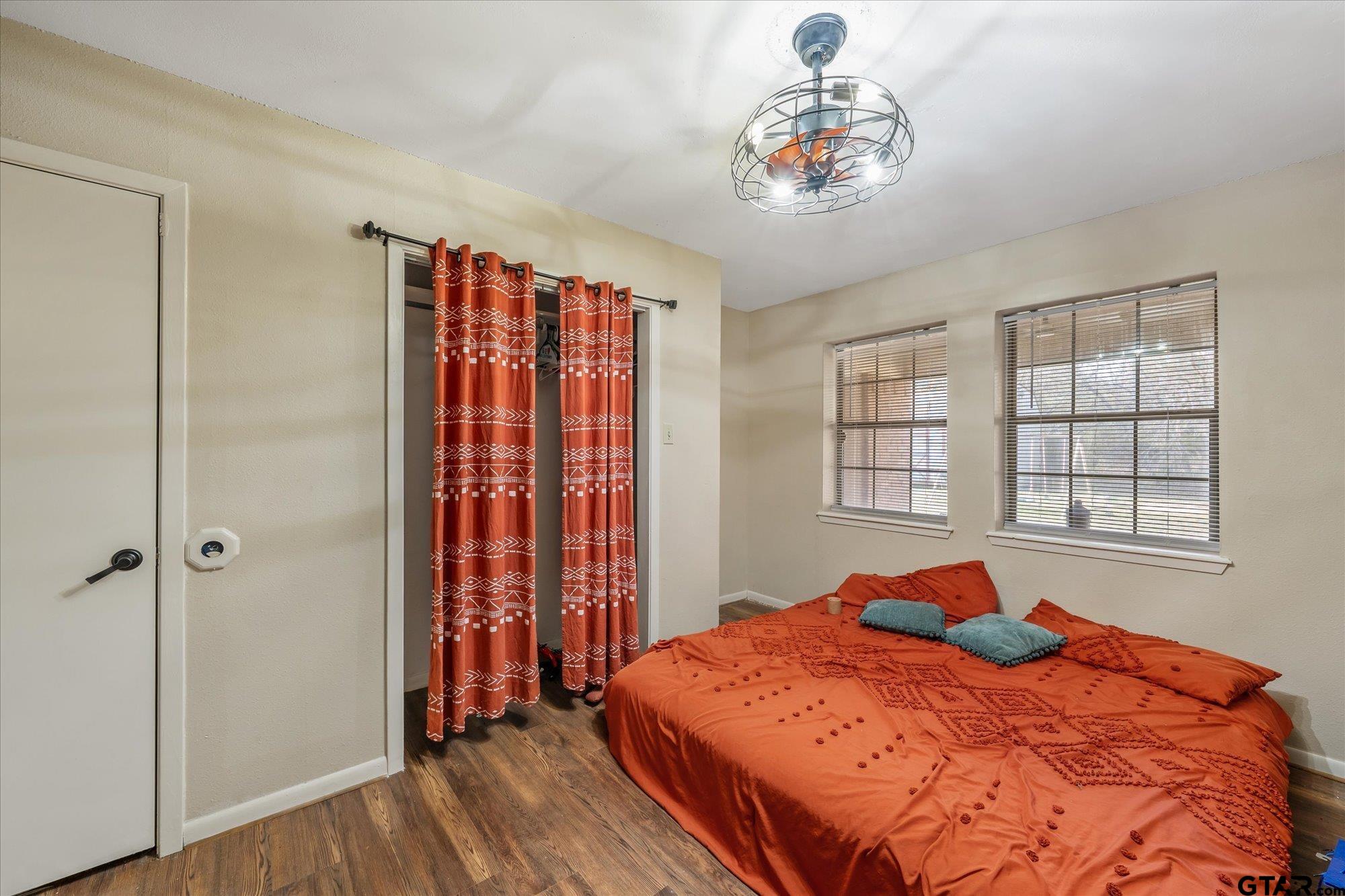 226 Colonial Circle Athens, TX 75751 - Photo 14 of 29 a bedroom with a bed and a window