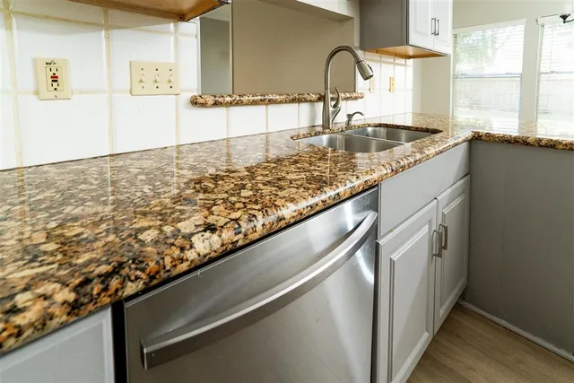 a view of a kitchen from a sink