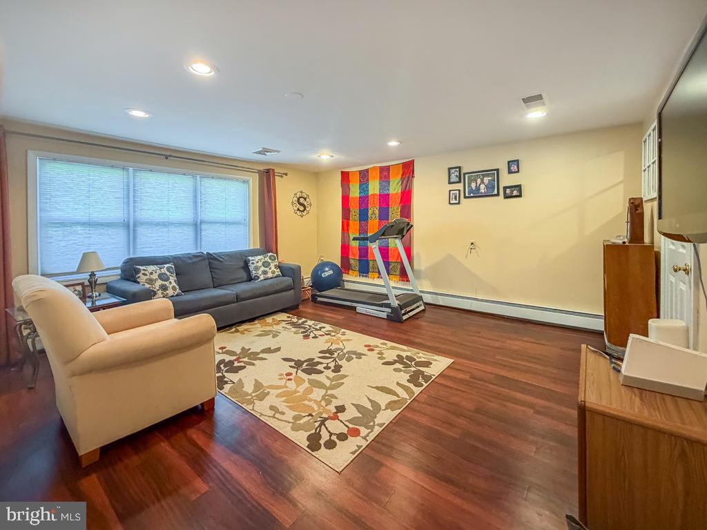 925 Big Oak Road Yardley, PA 19067 - Photo 22 of 51 a living room with a couch and a table