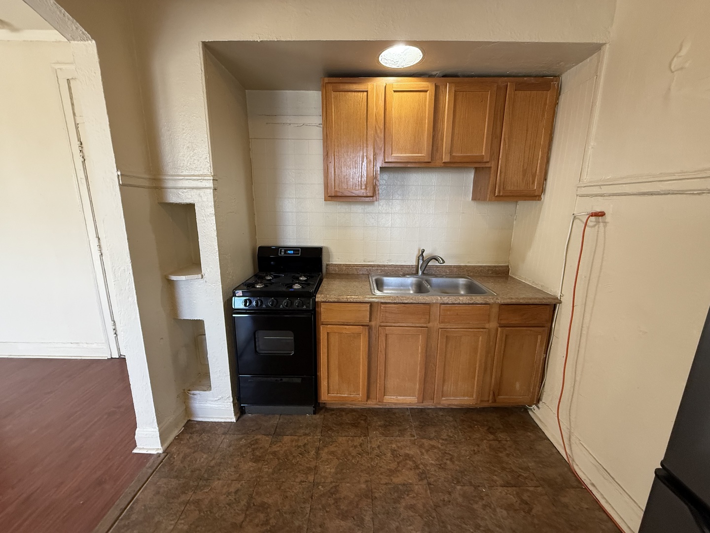 6930 North Greenview Avenue, Unit 608 Chicago, IL 60626 - Photo 6 of 10 a kitchen with stainless steel appliances granite countertop a refrigerator and a sink