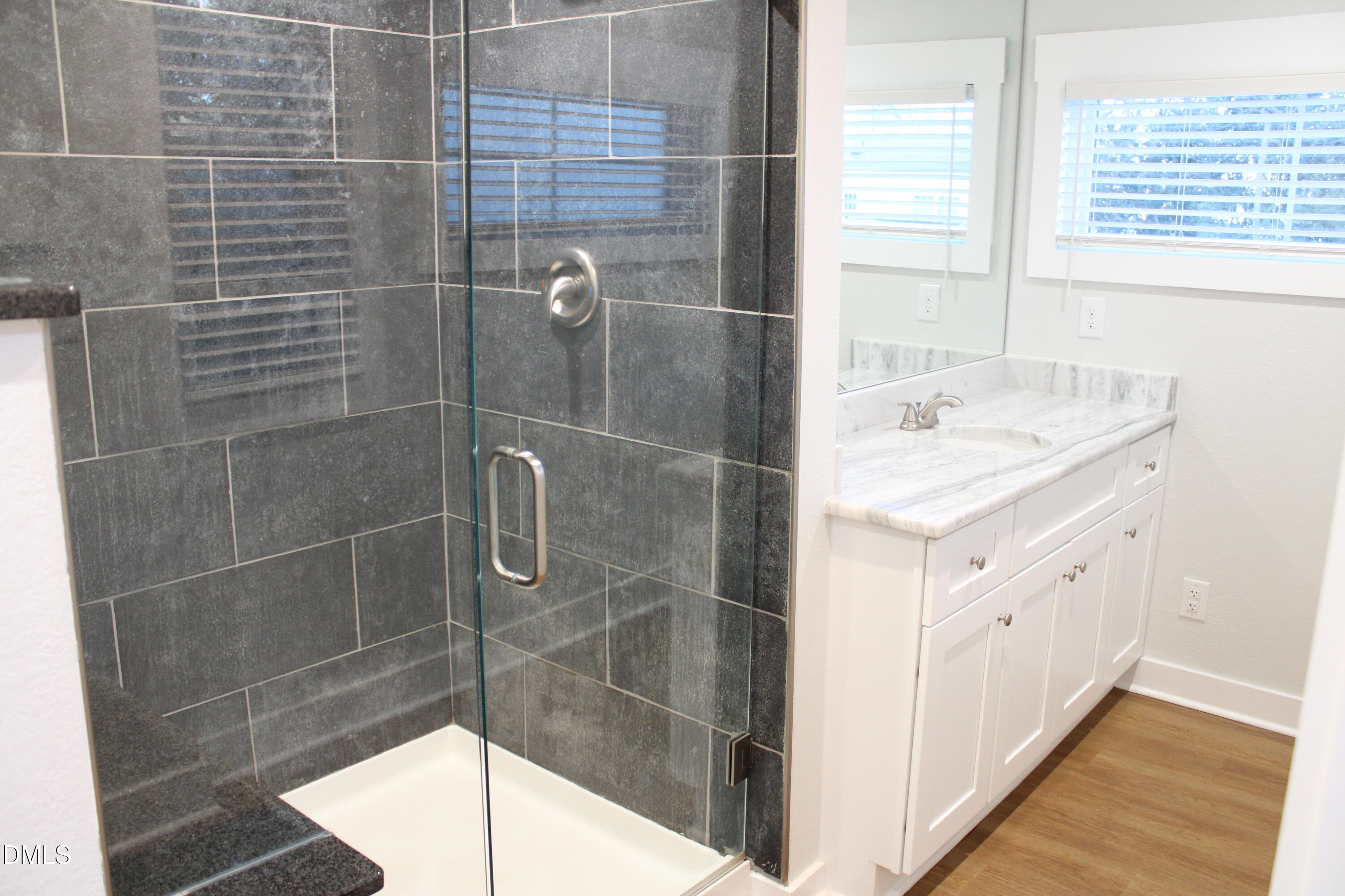 2812 Mayview Road Raleigh, NC 27607 - Photo 15 of 20 a bathroom with a shower and a sink