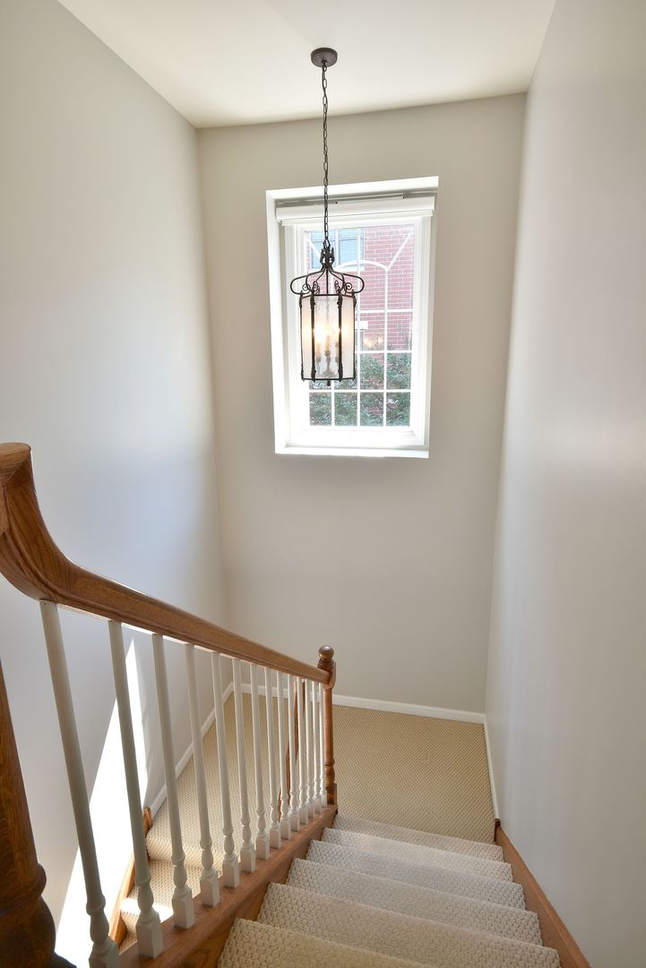 202 North Addison Avenue Elmhurst, IL 60126 - Photo 22 of 36 a view of a hallway with windows