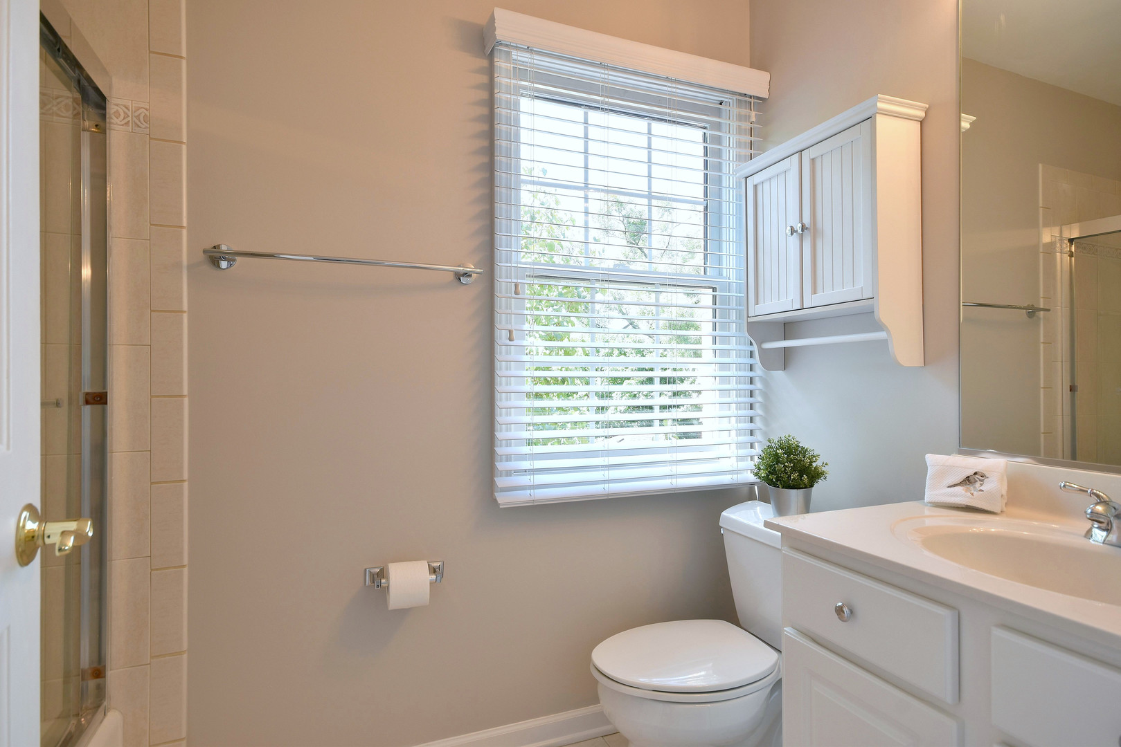 202 North Addison Avenue Elmhurst, IL 60126 - Photo 29 of 36 a bathroom with a sink a toilet and window