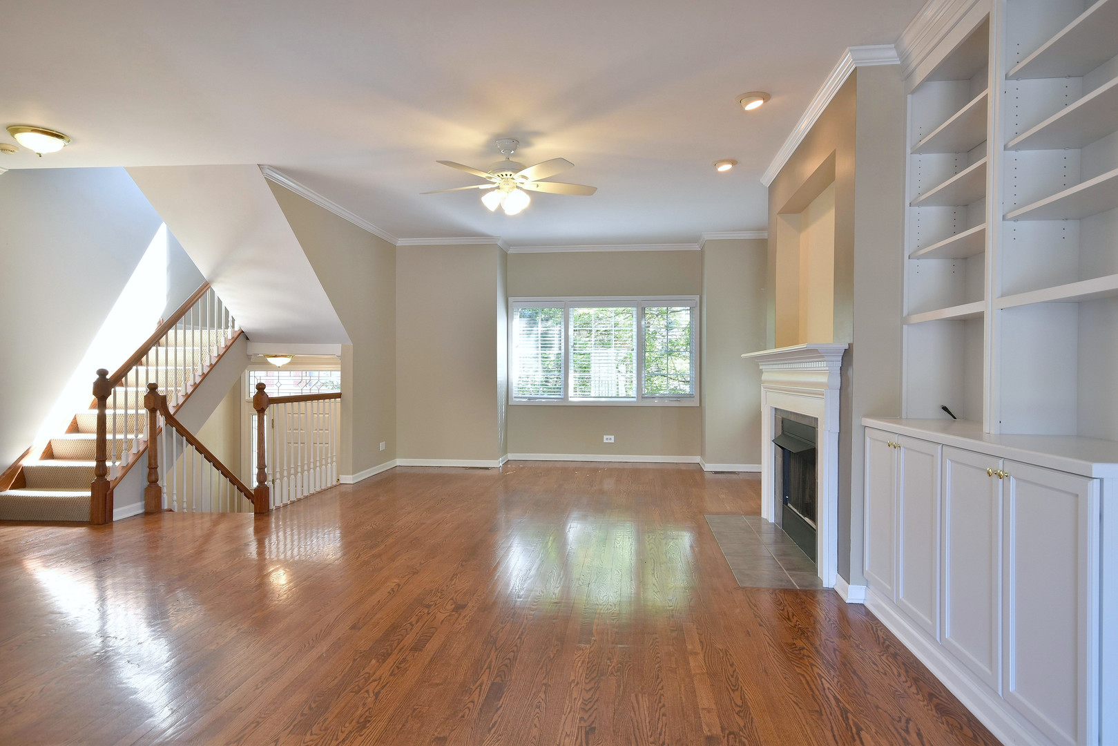 202 North Addison Avenue Elmhurst, IL 60126 - Photo 9 of 36 wooden floor in an empty room with a window