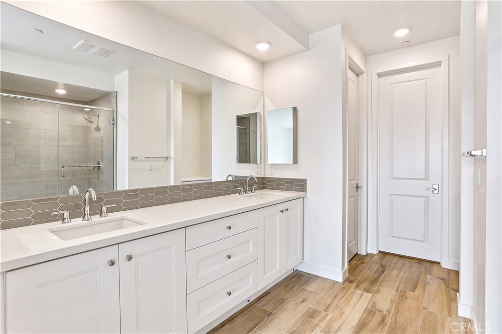 3185 Doheny Way Dana Point, CA 92629 - Photo 12 of 33 a bathroom with double sink and a mirror